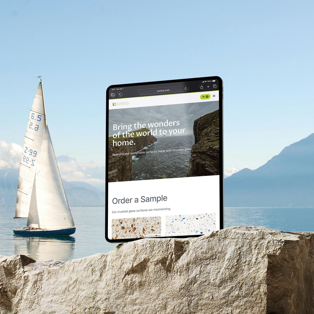 Tablet on a lakeside rock showing Curava’s Order a Sample page, with a sailboat behind it