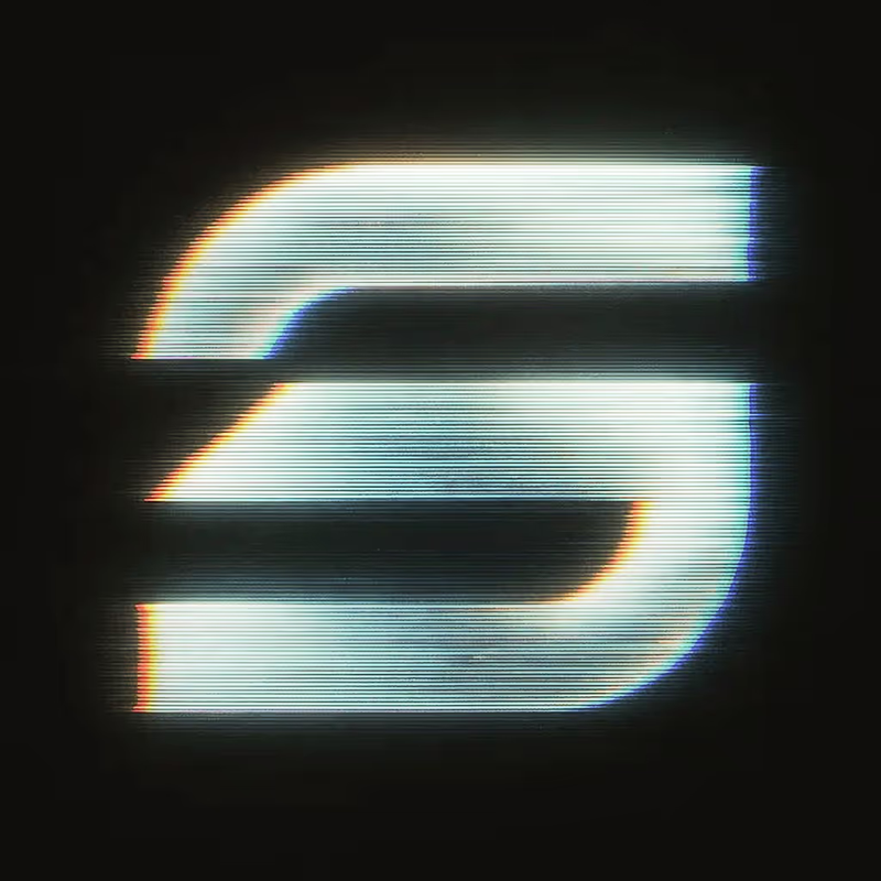 Glowing letter S on a black background